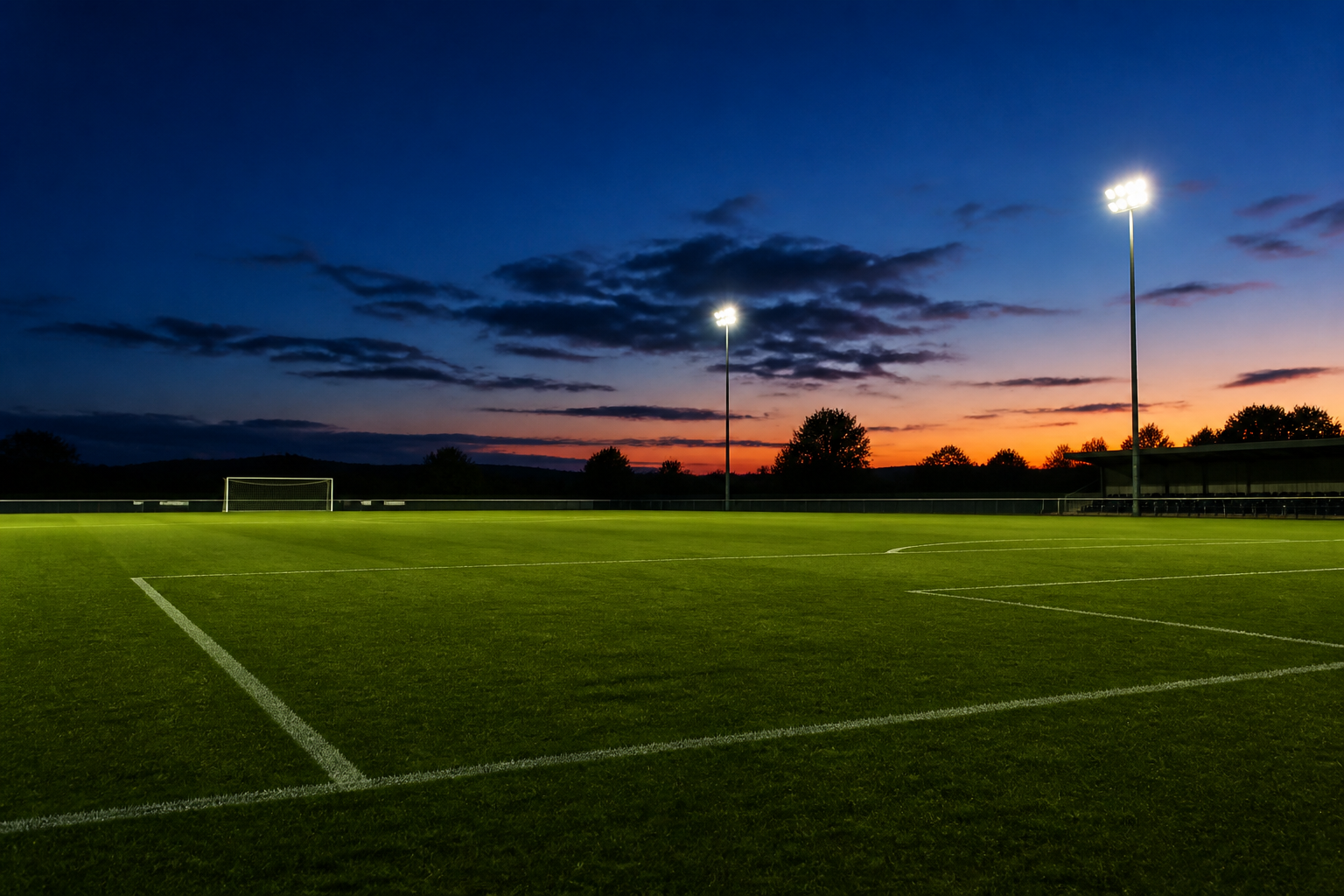 A football pitch in the United Kingdom at dusk